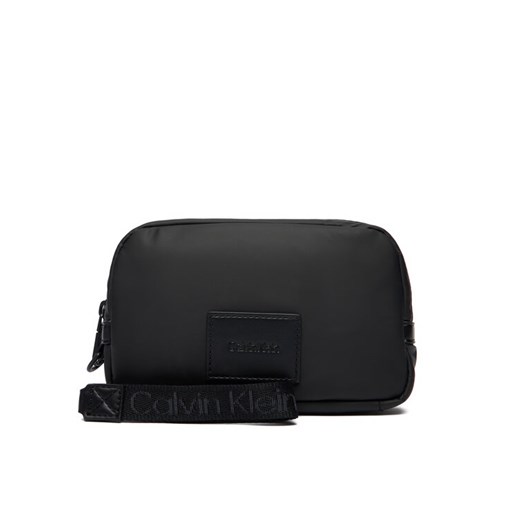 Calvin Klein Saszetka Puffer Utility Zip Puch LV04D1114G Czarny ze sklepu MODIVO w kategorii Torby męskie - zdjęcie 187359430