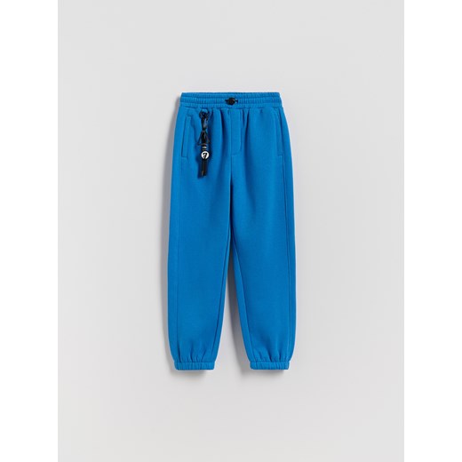 Reserved - Bawełniane spodnie jogger - jasnoniebieski ze sklepu Reserved w kategorii Spodnie chłopięce - zdjęcie 187363460