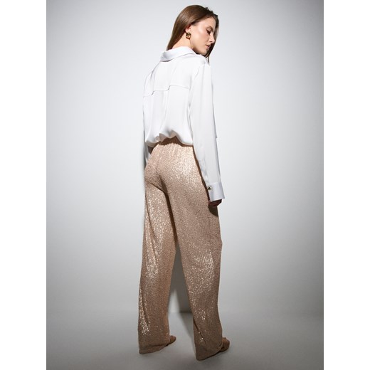 Sinsay - Spodnie wide leg z połyskującymi cekinami - złoty Sinsay S Sinsay