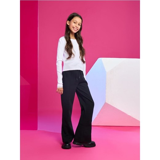 Sinsay - Spodnie dresowe flare - czarny ze sklepu Sinsay w kategorii Spodnie dziewczęce - zdjęcie 187364632