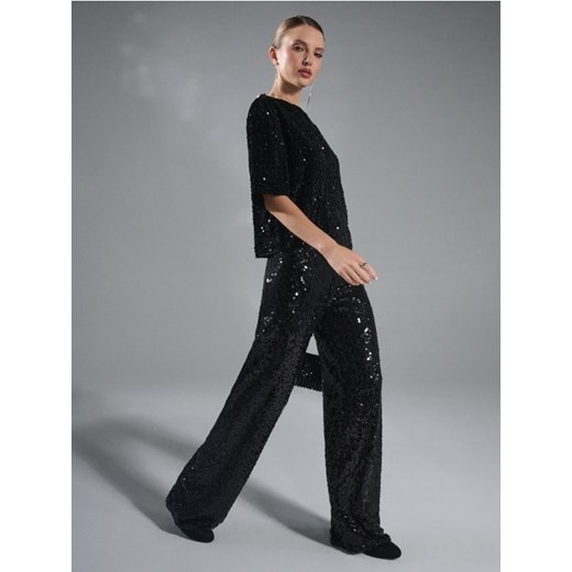 Sinsay - Spodnie wide leg z błyszczącymi cekinami - czarny ze sklepu Sinsay w kategorii Spodnie damskie - zdjęcie 187364663