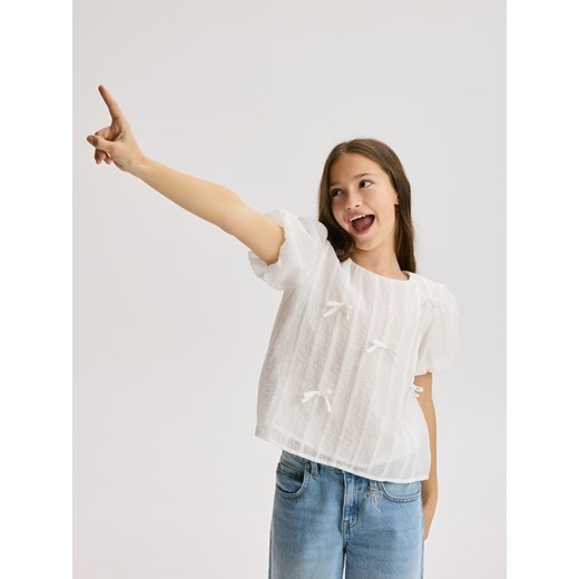 Reserved - Bluzka z kokardkami - złamana biel ze sklepu Reserved w kategorii Bluzki dziewczęce - zdjęcie 187368642