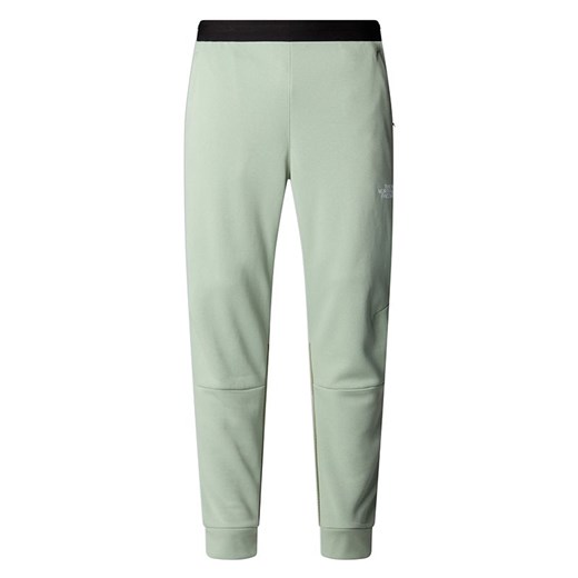 Spodnie męskie The North Face Mountain Athletics 0A893SD5M1 - zielone ze sklepu streetstyle24.pl w kategorii Spodnie męskie - zdjęcie 187377613