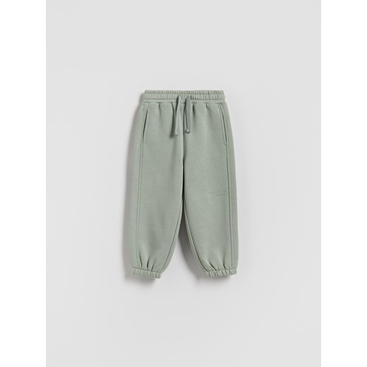 Reserved - Ocieplane spodnie jogger - jasnozielony ze sklepu Reserved w kategorii Spodnie chłopięce - zdjęcie 187380771