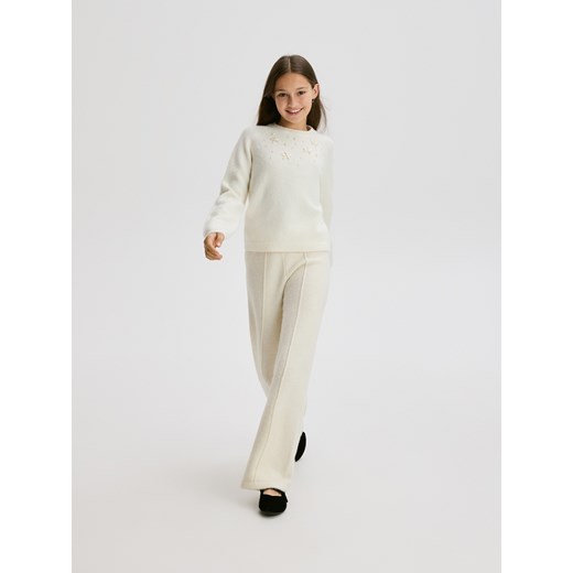 Reserved - Dzianinowy sweter z aplikacją - złamana biel Reserved 122 (6-7 lat) Reserved