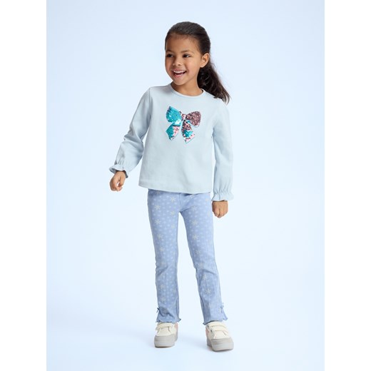 Reserved - Bawełniana bluzka z aplikacją - jasnoniebieski ze sklepu Reserved w kategorii Bluzki dziewczęce - zdjęcie 187381403