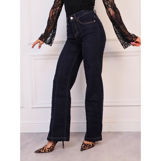 SPODNIE JEANSOWE FLARE DZWONY Z PRZESZYCIAMI NA NOGAWKACH- CIEMNOJEANSOWE ze sklepu olika.com.pl w kategorii Jeansy damskie - zdjęcie 187389723
