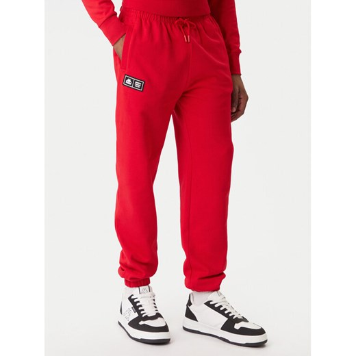Kappa Spodnie dresowe Olmos 311M2TW Czerwony Regular Fit ze sklepu MODIVO w kategorii Spodnie męskie - zdjęcie 187393043