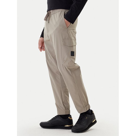 BOSS Spodnie materiałowe T_Urbanex-Cargolight 50508339 Zielony Tapered Fit ze sklepu MODIVO w kategorii Spodnie męskie - zdjęcie 187490624