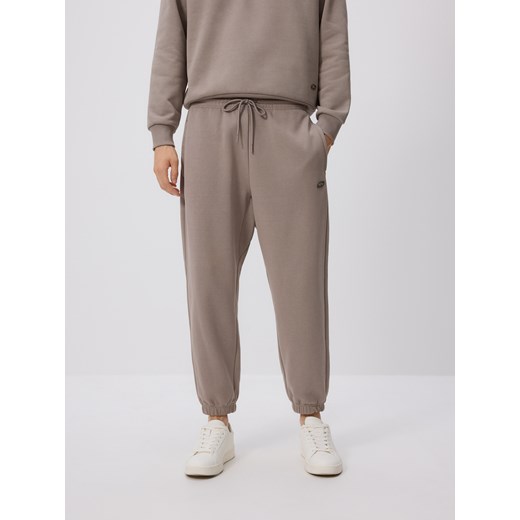 Reserved - Spodnie dresowe comfort fit - ciemnoszary ze sklepu Reserved w kategorii Spodnie męskie - zdjęcie 187496754
