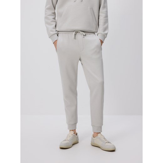 Reserved - Spodnie dresowe slim fit - jasnoszary ze sklepu Reserved w kategorii Spodnie męskie - zdjęcie 187514610