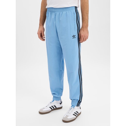 adidas Originals Męskie spodnie dresowe - Firebird Mężczyźni jasnoniebieski jednolity ze sklepu vangraaf w kategorii Spodnie męskie - zdjęcie 187521803