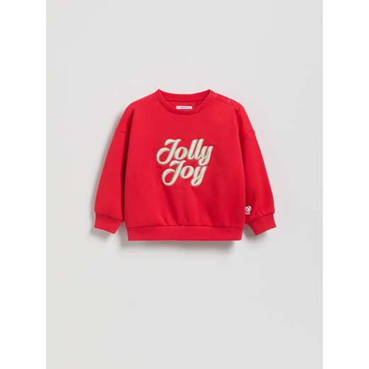 Reserved - Bluza ze świątecznym napisem - czerwony ze sklepu Reserved w kategorii Bluzy dziewczęce - zdjęcie 187524320