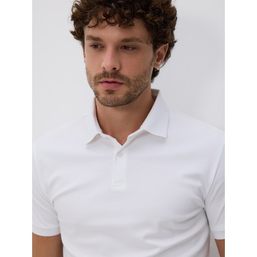 Reserved - Polo slim z bawełny pima - złamana biel ze sklepu Reserved w kategorii T-shirty męskie - zdjęcie 187527860