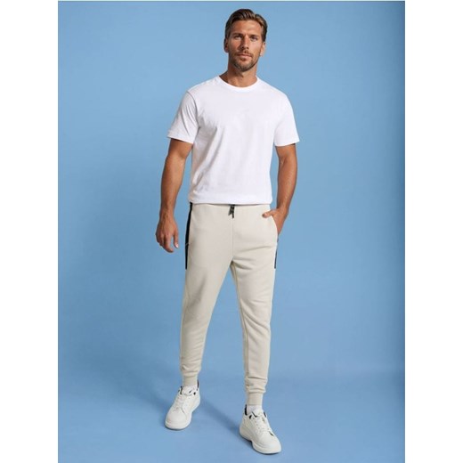 Sinsay - Spodnie dresowe - beżowy ze sklepu Sinsay w kategorii Spodnie męskie - zdjęcie 187528450