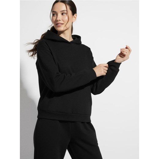 Sinsay - Dresowa bluza hoodie z kieszenią - czarny ze sklepu Sinsay w kategorii Bluzy damskie - zdjęcie 187530202
