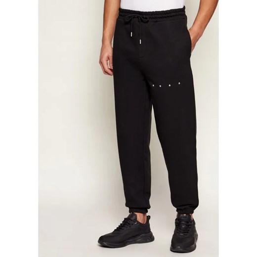 HUGO Spodnie dresowe Dolando | Relaxed fit ze sklepu Gomez Fashion Store w kategorii Spodnie męskie - zdjęcie 187535092