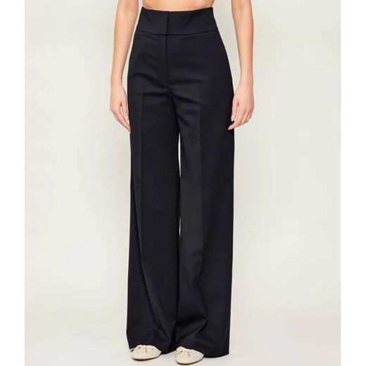 HUGO Spodnie Himia | flare fit | z dodatkiem wełny ze sklepu Gomez Fashion Store w kategorii Spodnie damskie - zdjęcie 187535124