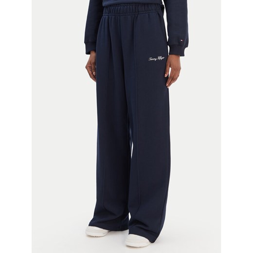 Tommy Hilfiger Spodnie dresowe Script WW0WW48784 Granatowy Relaxed Fit ze sklepu MODIVO w kategorii Spodnie damskie - zdjęcie 187594964