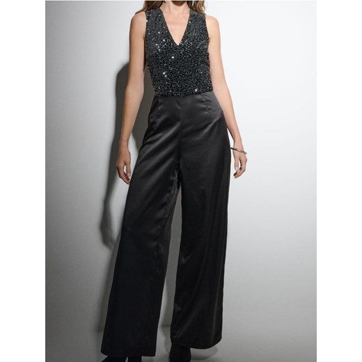 Sinsay - Kombinezon z cekinami - czarny ze sklepu Sinsay w kategorii Kombinezony damskie - zdjęcie 187610160