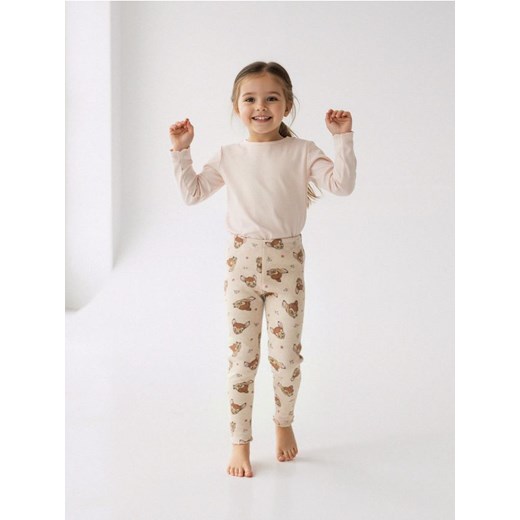 Sinsay - Bawełniane legginsy ze wzorem Bambi - beżowy ze sklepu Sinsay w kategorii Spodnie dziewczęce - zdjęcie 187615344