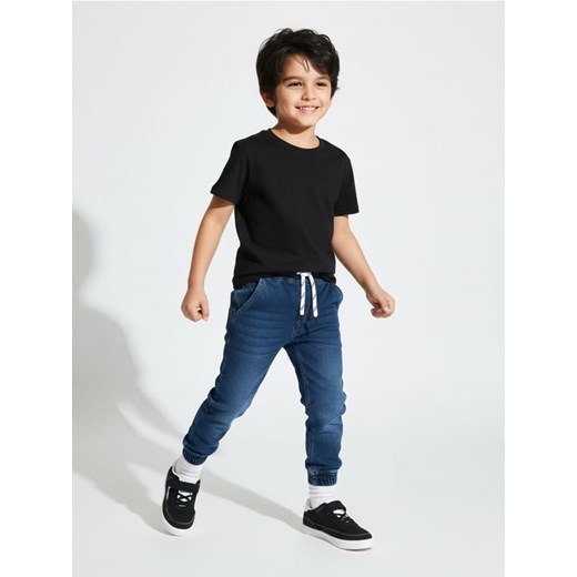 Sinsay - Jeansy jogger z efektem sprania - granatowy ze sklepu Sinsay w kategorii Spodnie chłopięce - zdjęcie 187615512