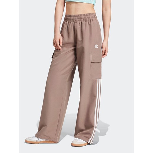 adidas Spodnie dresowe w kolorze jasnobrązowym ze sklepu Limango Polska w kategorii Spodnie damskie - zdjęcie 187625454