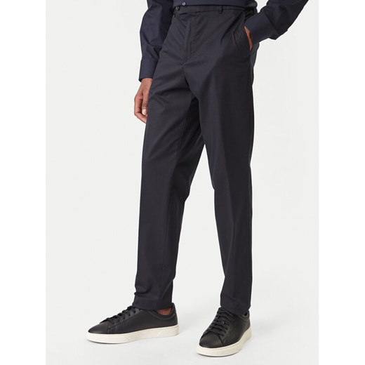 BOSS Spodnie materiałowe C-Perin 50555842 Granatowy Slim Fit ze sklepu MODIVO w kategorii Spodnie męskie - zdjęcie 187677114