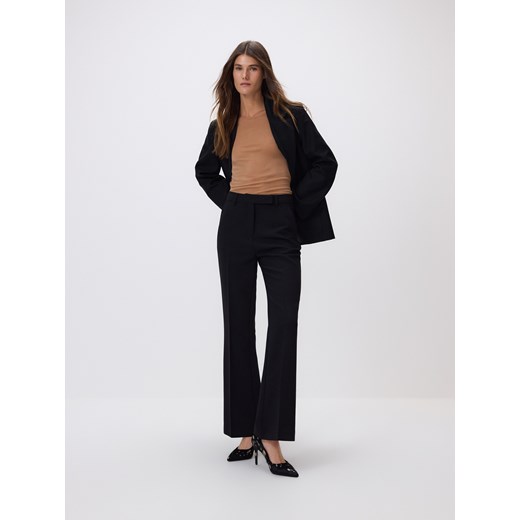 Reserved - Spodnie flare z metaliczną nitką - czarny ze sklepu Reserved w kategorii Spodnie damskie - zdjęcie 187683830