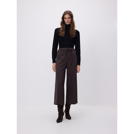 Reserved - Szerokie spodnie z wiązaniem - ciemnobrązowy Reserved 38 Reserved
