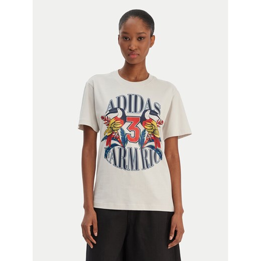 adidas T-Shirt Farm Rio Graphic KD4641 Écru Regular Fit ze sklepu MODIVO w kategorii Bluzki damskie - zdjęcie 187828142