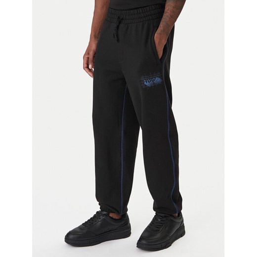 HUGO Spodnie dresowe Notharos 50553508 Czarny Regular Fit ze sklepu MODIVO w kategorii Spodnie męskie - zdjęcie 187828164
