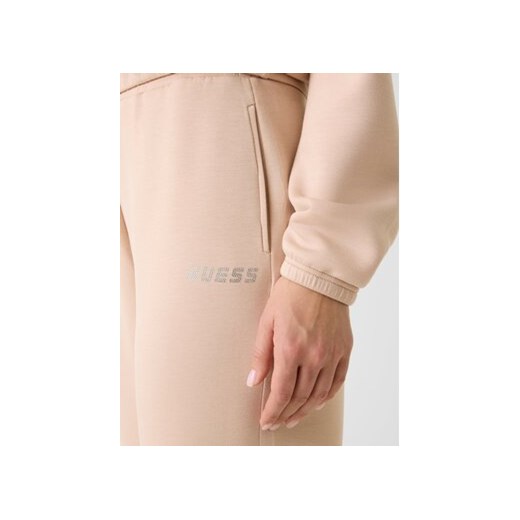 Guess Spodnie materiałowe 169841 Beżowy Slim Fit Guess XXS MODIVO