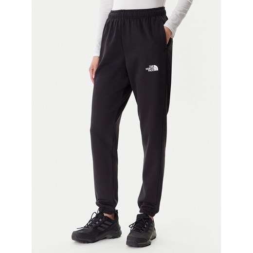 The North Face Spodnie dresowe Simple Dome NF0A8C1Y Czarny Regular Fit ze sklepu MODIVO w kategorii Spodnie damskie - zdjęcie 187924671