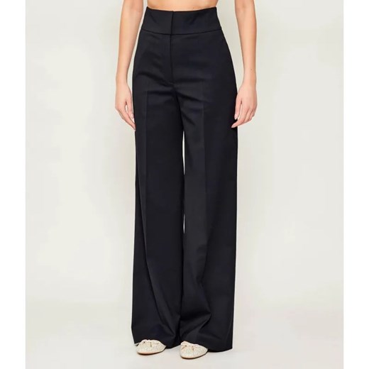 HUGO Spodnie Himia | flare fit | z dodatkiem wełny ze sklepu Gomez Fashion Store w kategorii Spodnie damskie - zdjęcie 187926761