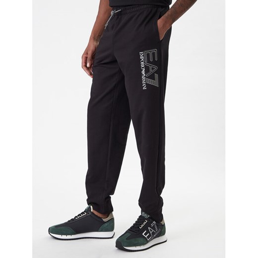 EA7 Emporio Armani Spodnie dresowe 7M001316 AF13512 UC001 Czarny Regular Fit ze sklepu MODIVO w kategorii Spodnie męskie - zdjęcie 187934141