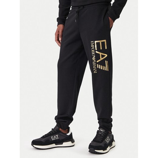 EA7 Emporio Armani Spodnie dresowe 7M001415 AF22266 MC004 Czarny Regular Fit ze sklepu MODIVO w kategorii Spodnie męskie - zdjęcie 187934200