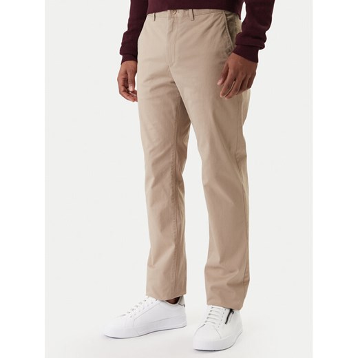Tommy Hilfiger Chinosy Denton Essential MW0MW40262 Beżowy Straight Fit ze sklepu MODIVO w kategorii Spodnie męskie - zdjęcie 187989242