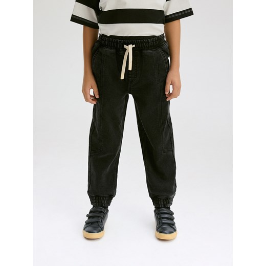 Reserved - Elastyczne jeansy jogger - czarny Reserved 170 (13-14 lat) okazja Reserved