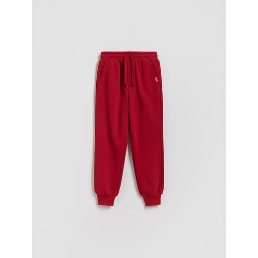 Reserved - Bawełniane spodnie jogger - czerwony ze sklepu Reserved w kategorii Spodnie chłopięce - zdjęcie 188067634
