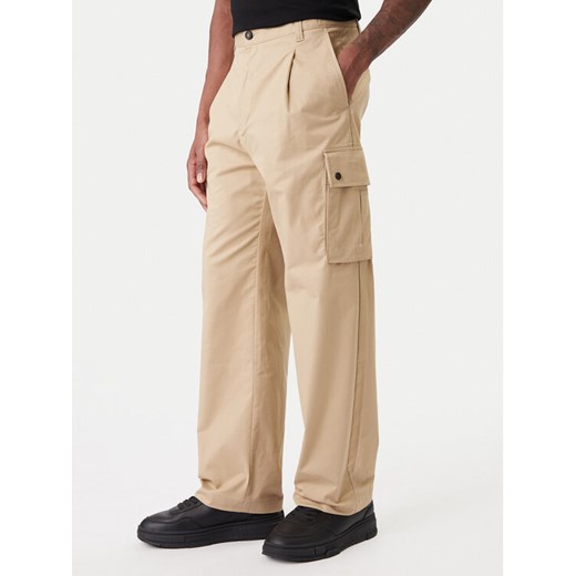 HUGO Spodnie materiałowe Craysen 50553180 Beżowy Straight Fit ze sklepu MODIVO w kategorii Spodnie męskie - zdjęcie 188095591