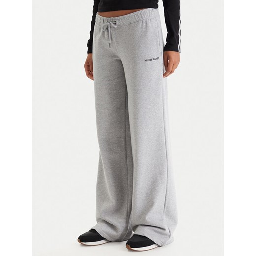 Guess Jeans Spodnie dresowe W6RB52 K68I4 Szary Regular Fit ze sklepu MODIVO w kategorii Spodnie damskie - zdjęcie 188427731