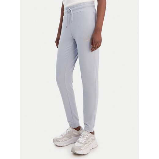 EA7 Emporio Armani Spodnie dresowe 8NTP66 TJ9RZ U9309 Błękitny Regular Fit ze sklepu MODIVO w kategorii Spodnie damskie - zdjęcie 188868934