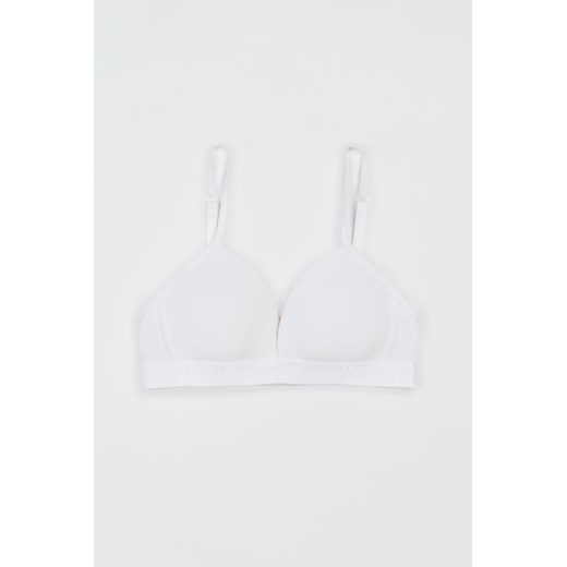 Biały bawełniany stanik na ramiączkach z ozdobną gumą, Rozmiar - 140, Kolor - Biały ze sklepu REPORTER w kategorii Staniki dla dziewczynki - zdjęcie 189107404