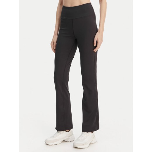 Calvin Klein Performance Legginsy Icon LVGWS6L648 Czarny Flare Fit ze sklepu MODIVO w kategorii Spodnie damskie - zdjęcie 189387441