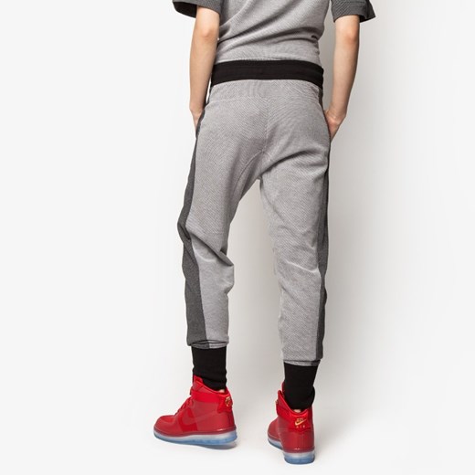 NIKE SPODNIE RALLY PLUS PANT JOGGER szary Nike S Sizeer