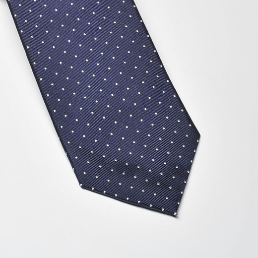 Granatowy krawat jedwabny w białe kropki