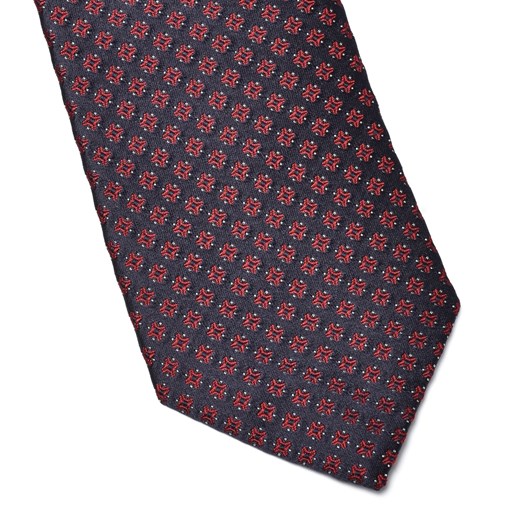 Granatowy krawat jedwabny w czerwony wzór graficzny