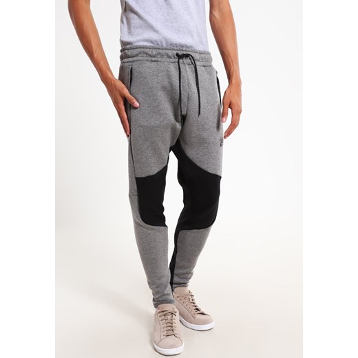 Nike Sportswear TECH FLEECE Spodnie treningowe carbon heather/black