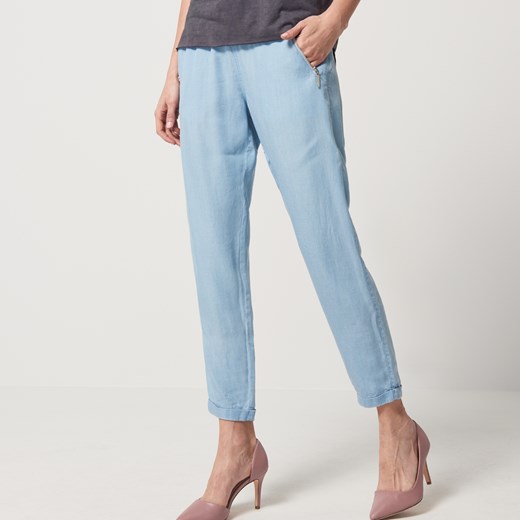 Mohito - Jeansowe spodnie w luźnym stylu - Niebieski niebieski Mohito 38 
